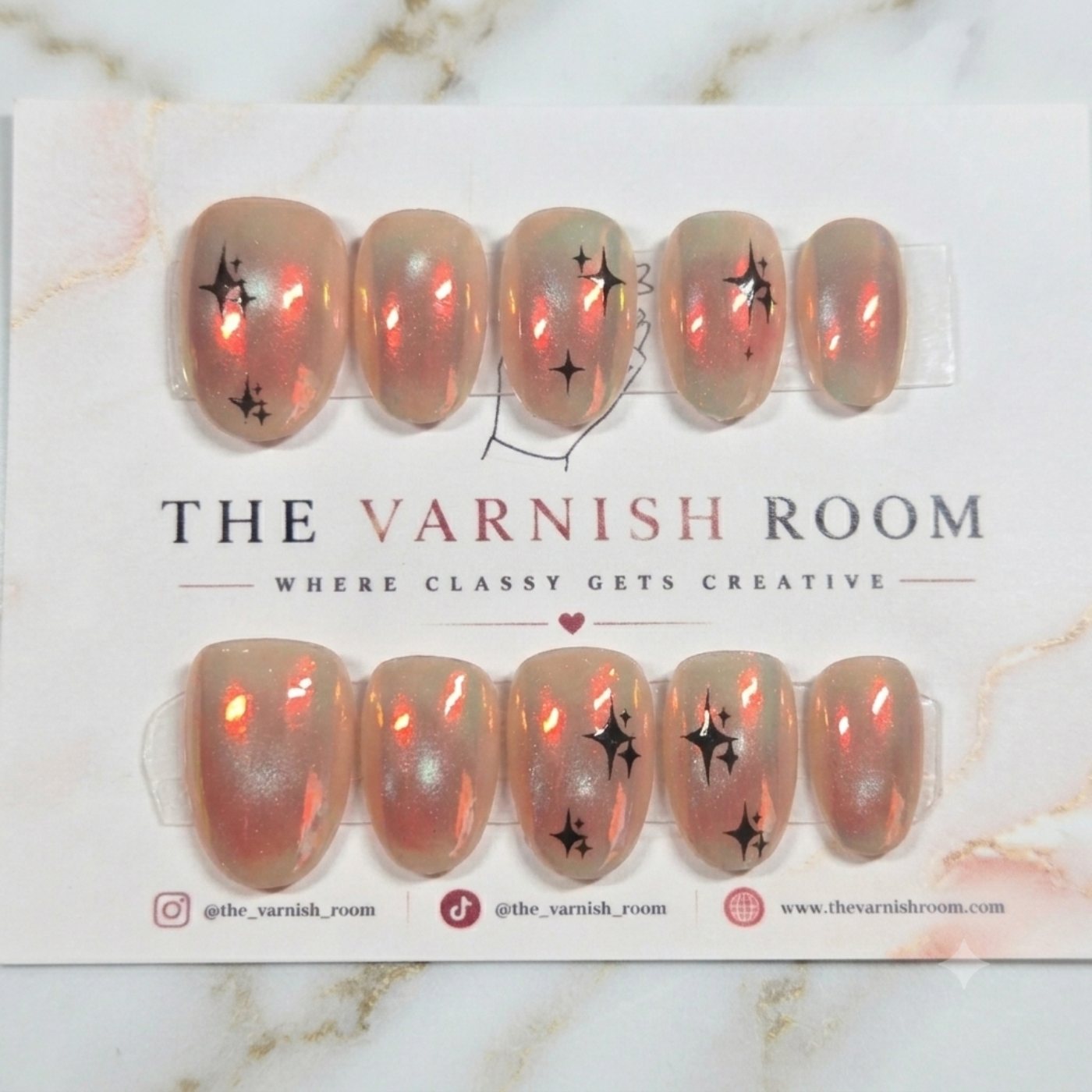 Iridescent Opal Starburst — hand-painted press-on nail set by The Varnish Room